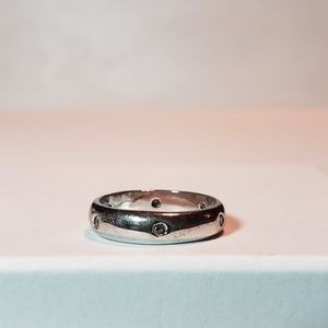 Sterling silver and CZ bezel set ring, 7.5